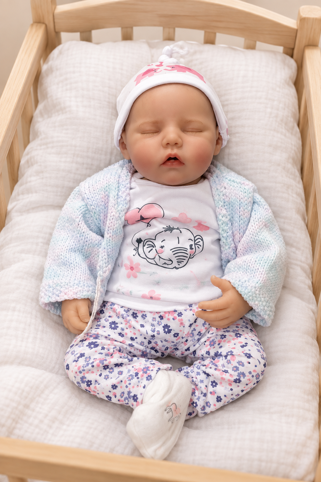 Kerry asleep in cot